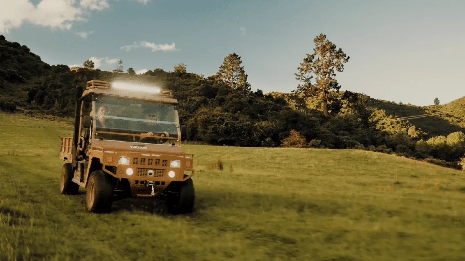 tuatara electric utv Tuatara electric UTV driving across farmland